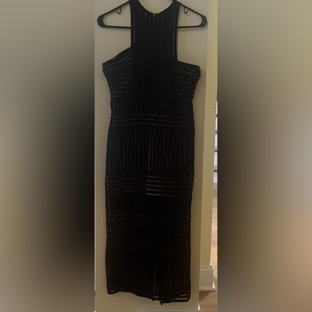 a midi sleeveless, above knee slip inside attached to the dress, medium size